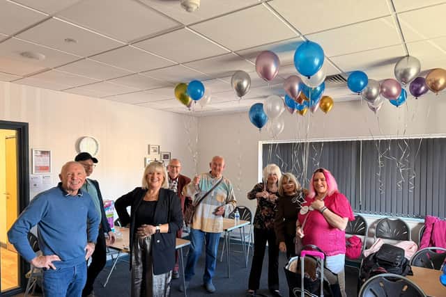 Volunteers and founder Karen Gardner, third left