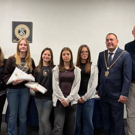 From L to R - Melonie and Suzanne (Young Women's leaders) , Nevaeh, Sophie, twins Millie and Harper with  Minister Mark Andrews (far right) from The Church of Jesus Christ of Latter-day Saints with Northampton Mayor, Mike Hallam (2nd R)