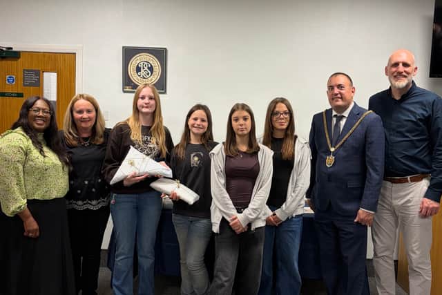 From L to R - Melonie and Suzanne (Young Women's leaders) , Nevaeh, Sophie, twins Millie and Harper with  Minister Mark Andrews (far right) from The Church of Jesus Christ of Latter-day Saints with Northampton Mayor, Mike Hallam (2nd R)