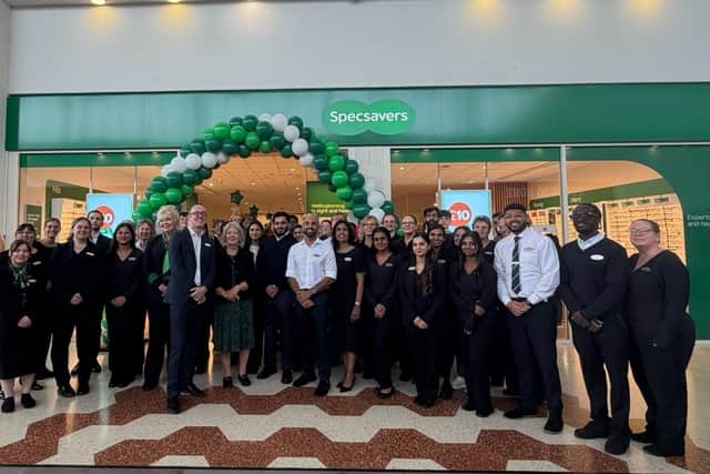 The Specsavers team outside the store