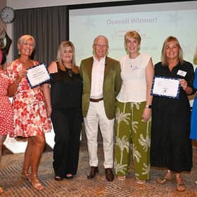 Footsteps Travel, who were the highest fundraising team for the 2026 Challenge with Emily Griffiths from the Lewis Foundation (far left), Nick Hewer (centre) and Andrea Humphrey (far right).

