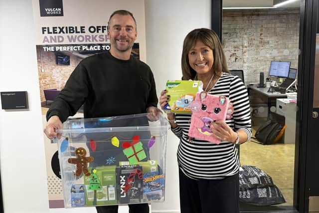 Darren Smith (left) with Gail Haddon (right) launching Vulcan Works’ Mother Christmas present appeal.