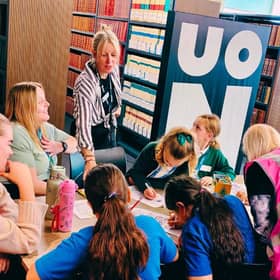 Dr Laura-Jane Devanny, Senior Lecturer in Education (standing) oversees poetry challenge at the Big50 Book Festival.