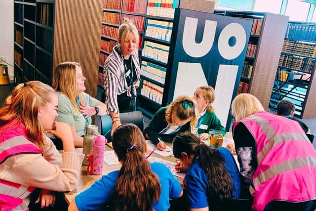 Dr Laura-Jane Devanny, Senior Lecturer in Education (standing) oversees poetry challenge at the Big50 Book Festival.