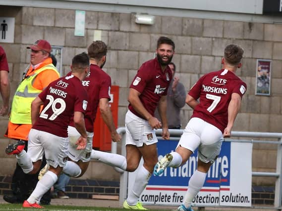 Jordan Turnbull celebrates making it 2-0. Pictures: Pete Norton