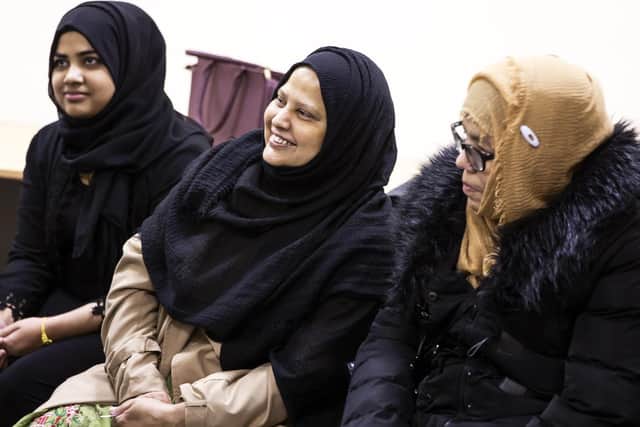 The 'conversation cafe' teaches women English.