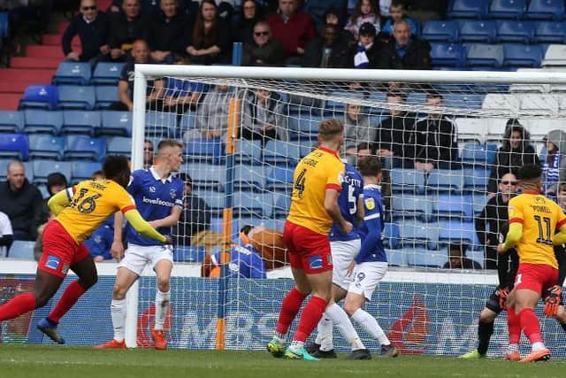 Aaron Pierre heads in at Boundary Park