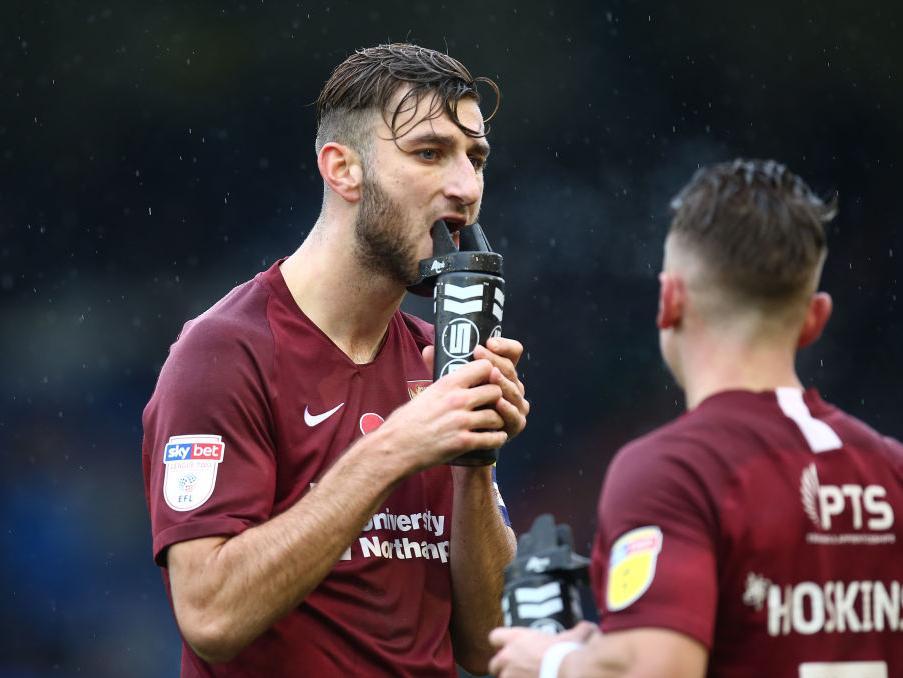 A soaked Charlie Goode takes a drink during Saturday's 2-2 draw. Picture: Pete Norton
