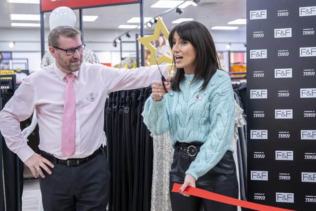Davina McCall cuts the ribbon on the new, expanded F&F section at Tesco Mereway with store manager Ian Dunne