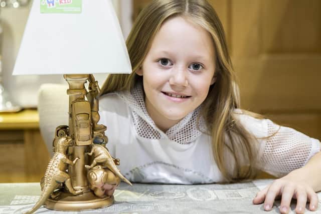Mimi Pilcher is upcycling a lamp - just one way of reducing waste