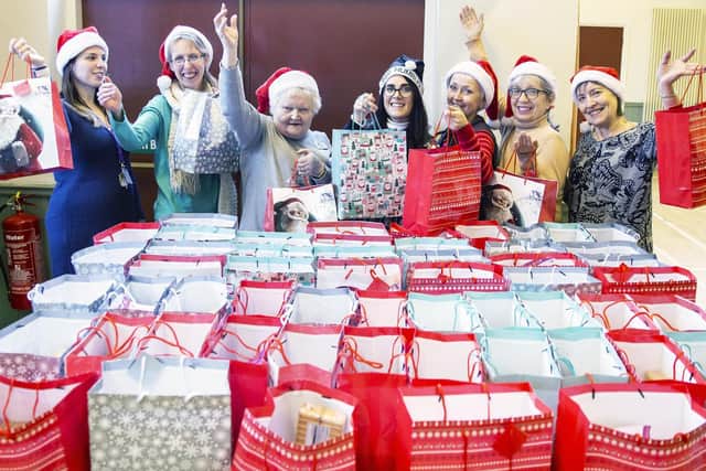 The hard-working volunteers are aiming to have 160 more gifts to donate to members of the community this year.