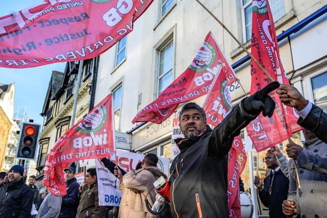 Protesters gathered outside Bounds Taxis in Bradshaw Street today.