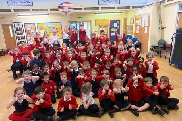 The winning pupils from Little Houghton, whose song "It's Christmas" took third place in a national radio competition.