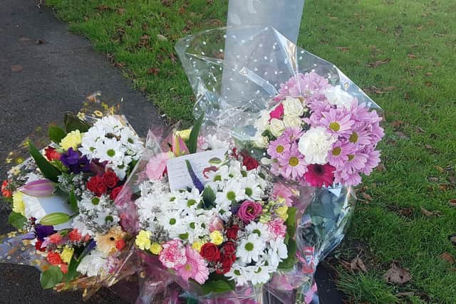 Flowers are being left at the scene