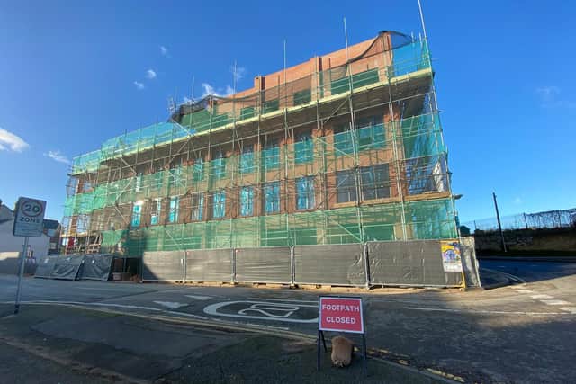 The building site has taken over the path on Stanhope Road, creating a blind spot for pedestrians