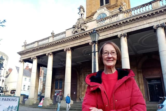 Chron reader Rosemary Twelfthtree, who dropped off a handmade play dress for a little girl and an armful of stocking filler toys for all ages.