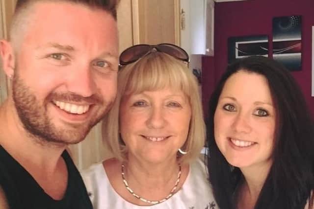 Marion Price pictured with her son Gary and daughter Toni.