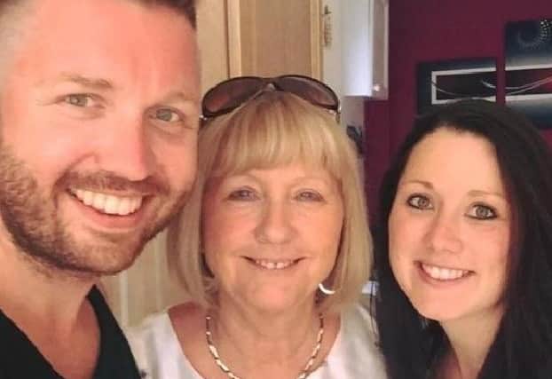 Marion Price pictured with her son Gary and daughter Toni.