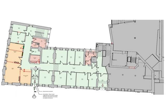 The plans show room for nine studios and a larger project room.