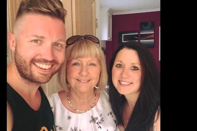Marion Price (centre) pictured with her son Gary and daughter Toni