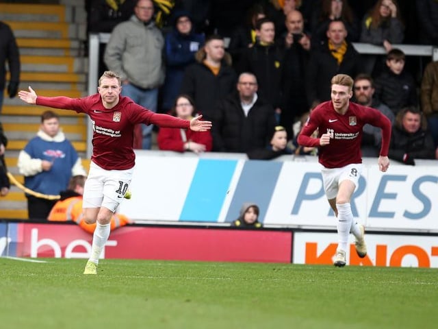 Nicky Adams celebrates, chased by Ryan Watson