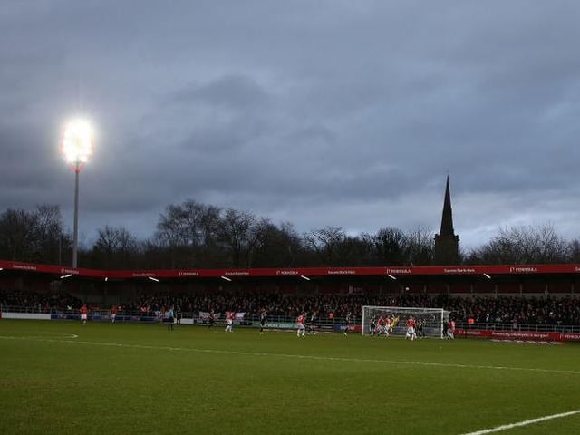 The packed away end at the Peninsula Stadium