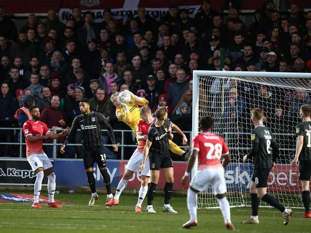 David Cornell claims a cross