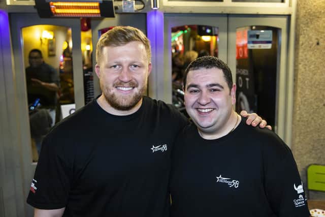 (L-R) Northampton Saints player James Fish and landlord Mark Prendiville at the bike challenge