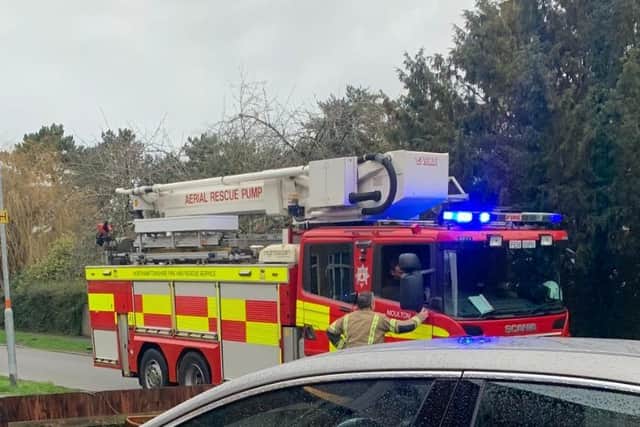 The fire service sent a crew with small rescue gear and blocks to stabilise the van and free Socks from the engine.