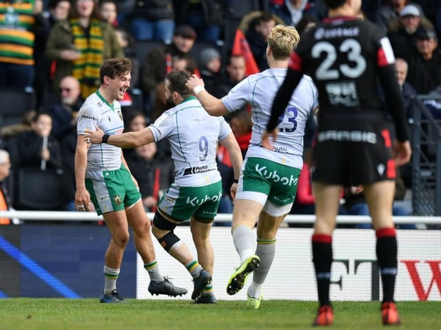 George Furbank celebrates his try