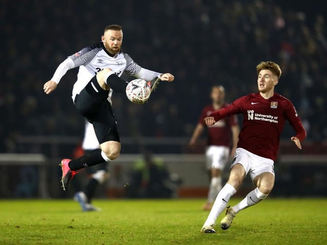 Wayne Rooney gets the ball under control