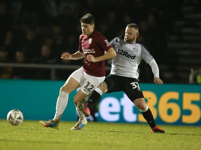 Wayne Rooney tackles Cobblers teenager Scott Pollock