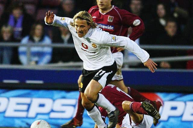 Ian Sampson tackles Diego Forlan during the 2004 FA Cup tie at Sixfields. Picture: Pet