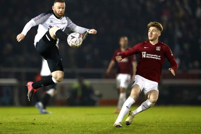 Ryan Watson and his fellow midfielders kept Derby County's Wayne Rooney quiet in the first game between the sides