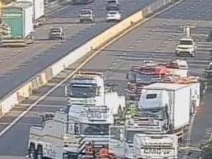 Image of the recovery vehicles the morning after the crash. Image courtesy of Highways England.