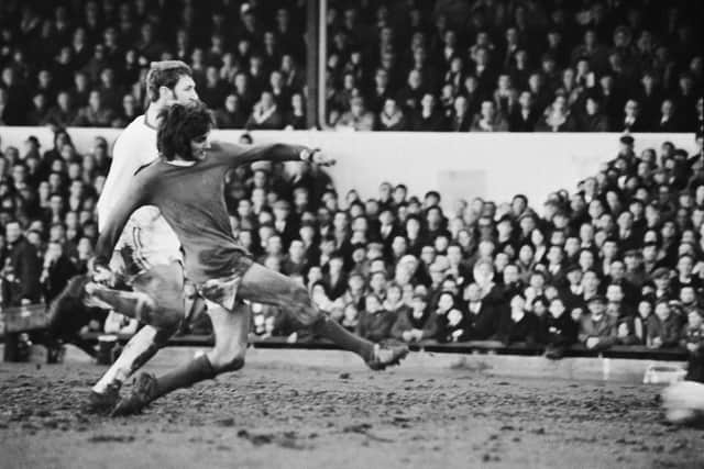 George Best scores his fifth goal for Manchester United during their 8-2 win over the Cobblers in 1970