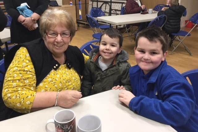 Hartley (right) with his Nan (left) and cousin (middle) at the big breakfast.