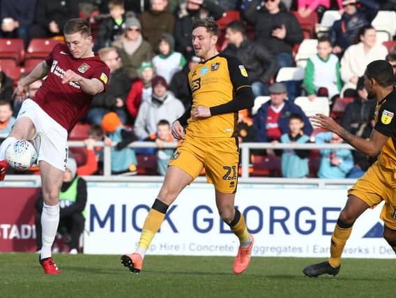 Scott Wharton clears the ball away. Pictures: Pete Norton