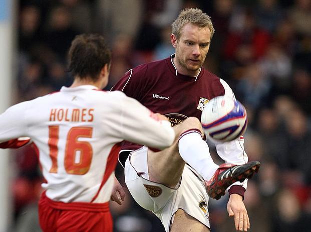 Poul Hubertz keeps his eyes on the ball
