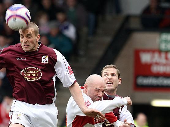 Andy Holt gets the better of Tommy Mooney