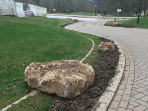 Several boulders have been placed on a grass verge on Sharpe Street in the Oak View housing development in Towcester to stop motorists from using it