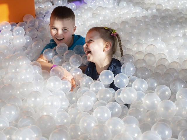Kids enjoy the huge ball pit at Gravity in Sol Central