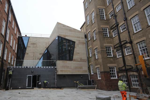Work is ongoing to complete the new-look Northampton Museum and Art Gallery courtyard and facade on Guildhall Road. Photo: Northampton Borough Council