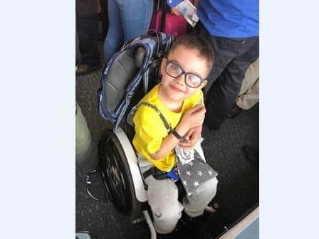 Rowan has outgrown his wheelchair, so a group of runners are fundraising to buy him a new one.