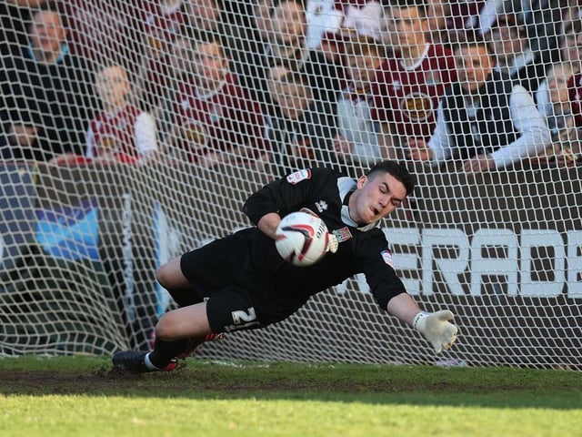 Alex Nicholls saves Marlon Pack's penalty