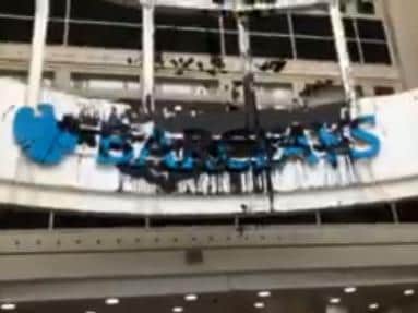 Protesters spread dye over the Barclays sign inside the building.
