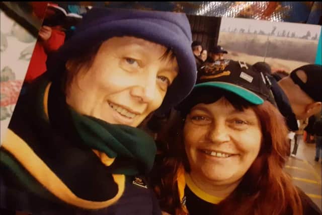 Helen (right) with her friend (Wendy) who watched the Saints with her.