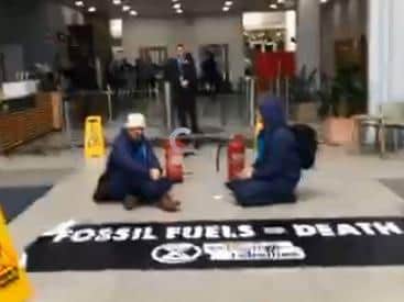 Climate change protesters make their point in the reception area