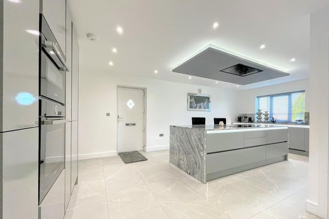 The kitchen island with overhead extractor