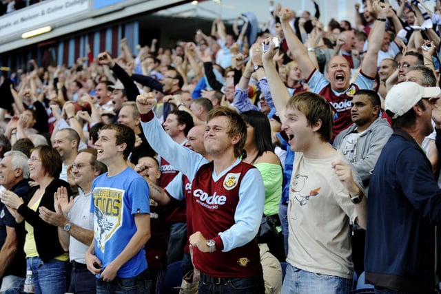 Supporters celebrate Robbie Blake's winner against defending Premier League champions Manchester United at Turf Moor in 2009.